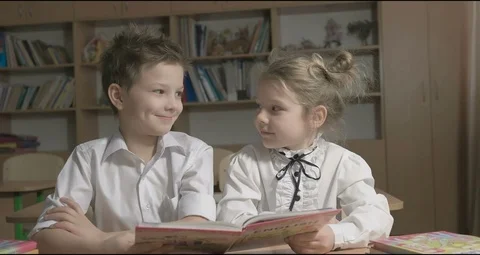 Children learning and doing homework in school classroom Stock Footage 71508660
