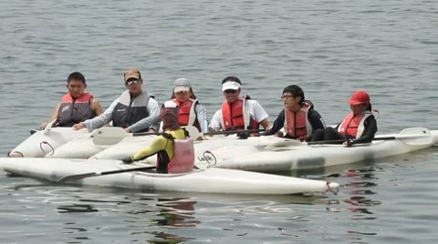 Children learning to canoe Stock Footage