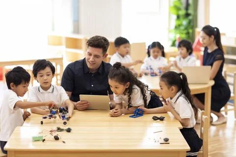  Children learning coding in classroom Beijing China Copyright: xLanexOate... Stock Photos