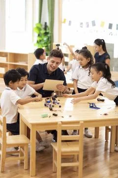  Children learning coding in classroom Beijing China Copyright: xLanexOate... Stock Photos