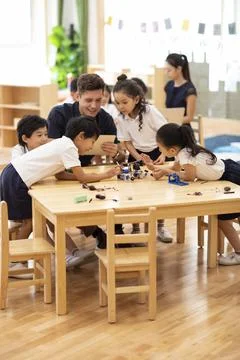  Children learning coding in classroom Beijing China Copyright: xLanexOate... Stock Photos