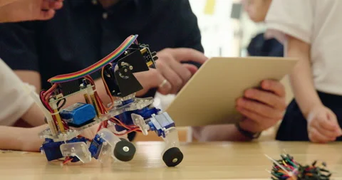 Children learning coding in kindergarten classroom,4K Stock Footage 146869925