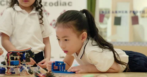 Children learning coding in kindergarten classroom,4K Stock Footage 146870298