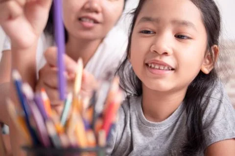 Children learning with parent Foto stock