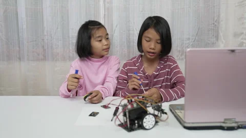 Children learning robotic education of technology in classroom Stock Footage 202132668