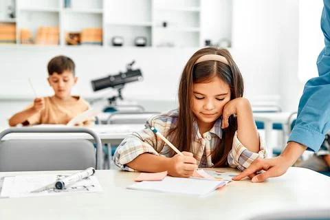 Children learning in a school classroom Stock Photos