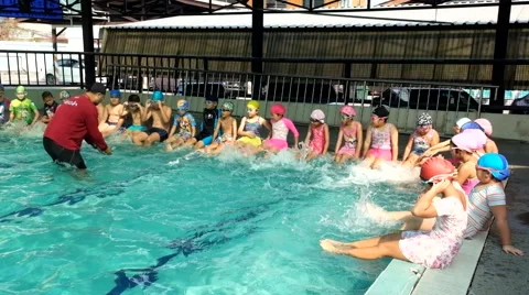 Children learning to swim Stock Footage 46833789
