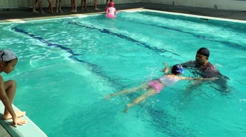 Children learning to swim Stock Footage 46835077