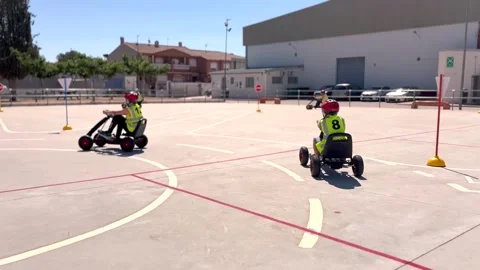 Children Learning Traffic Rules in Road Safety Class with Toy Cars – Pr Stock Footage 309519927
