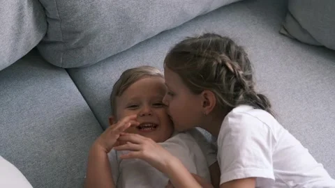 Children lie on the couch and dare. Stock Footage 150508053