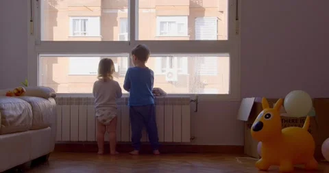 Children looking out of window Video stock 147560678