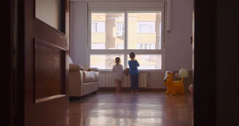 Children looking out of window Video stock 147560704