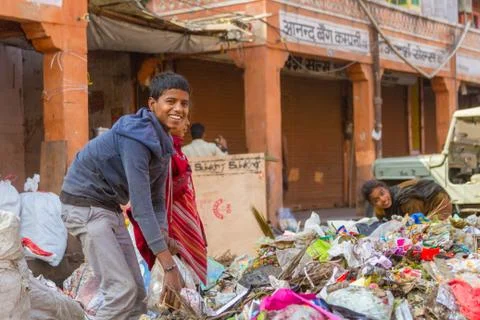 Children Looking thru Garbage Stock Photos