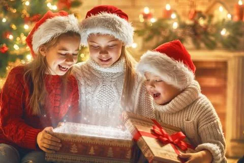 Children with magic gift box Stock Photos