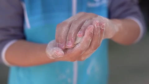 Children make bread dough at school. Cooking class. Video stock 266828826