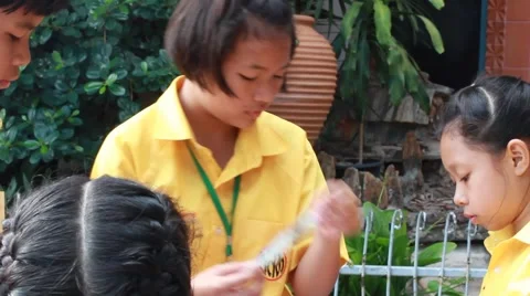 Children make paper mache at Elementary School. Bangkok Thailand Stock Footage 64457728