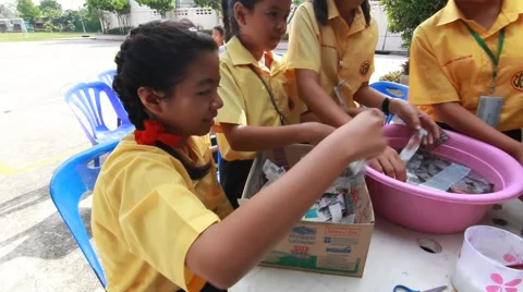 Children make paper mache at Elementary School. Bangkok Thailand Stock Footage 64458016