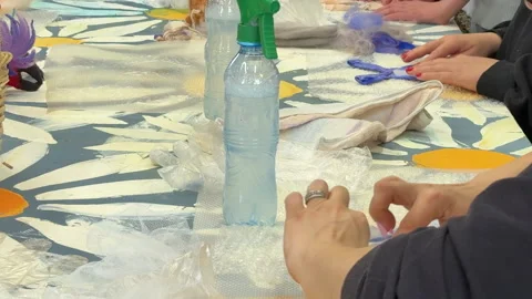 Children make a rabbit toy out of wool at a master class on wet felting 스톡 동영상 306574243
