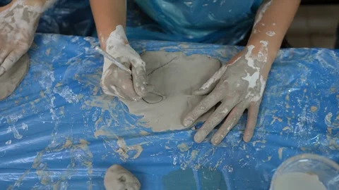 Children Make Shapes From Ceramic Mud Stock Footage 241722619