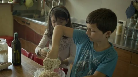 Children making bread Stock Footage 76794399