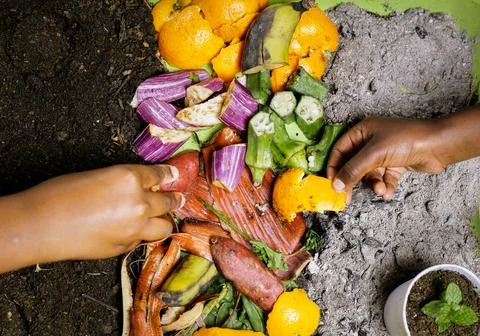 Children making composting Stock Photos