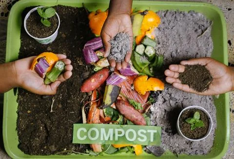 Children making composting Stock Photos