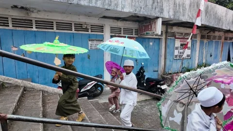 Children Marching With Decorated Umbrellas During Maulid Parade Stock Footage 345157976