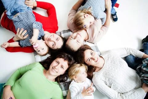 The children with moms Stock Photos