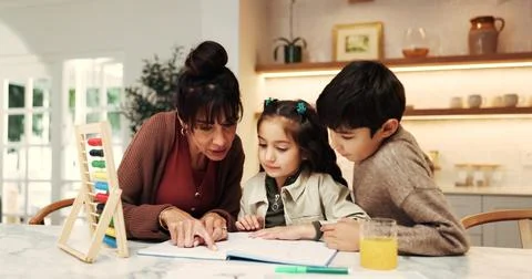 Children, mother and help with homework, support and book for math, knowled.. Stock Photos