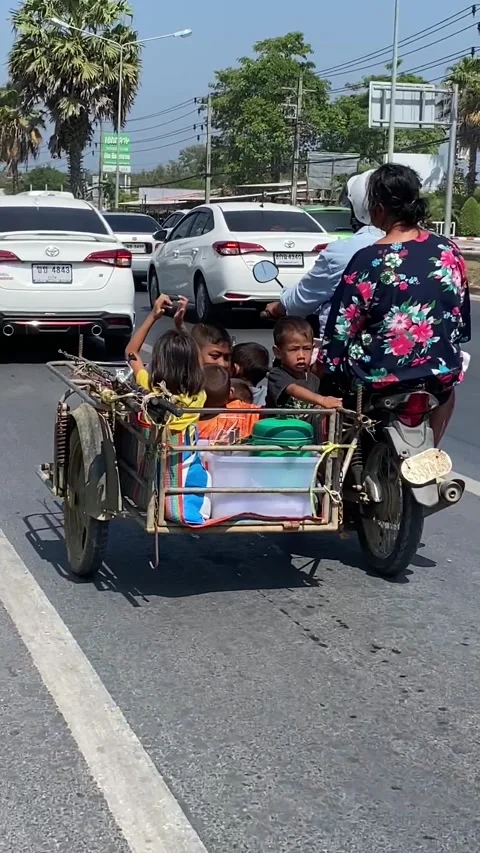 Children in motorcycle stroller 스톡 동영상 131801798