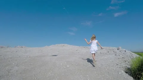 Children from the mountain run with a kite. Stock-Footage 53466548