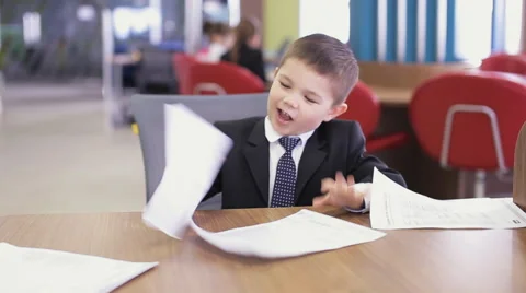 Children in office review documents Stock Footage 61261232