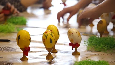 Children paint Easter eggs Stock Footage 87644167