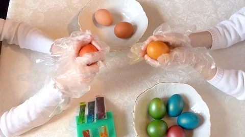 Children paint Easter eggs Stock Footage 125329775