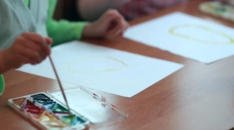 Children paint on paper Stockbeeldmateriaal 49206109