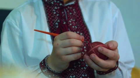 Children paint traditional Easter eggs Stock Footage 74828229