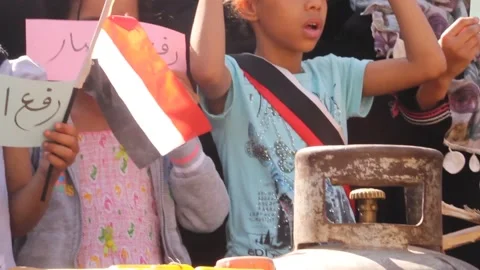 Children participate in a protest against the continuing war and siege in Yemen Stock Footage 168821073