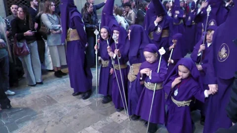 Children-participating-in-semana-santa-procession-in-Malaga Stock Footage 335942522