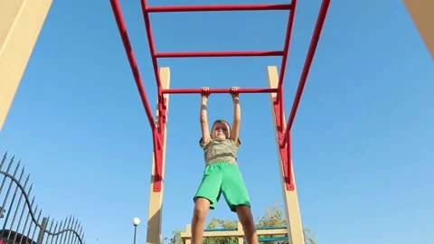 Children physical exercise-Pull-ups Stock Footage 139032286