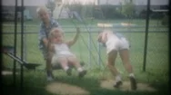 Children Play On Backyard Swing Set In Suburbia 1950S  Home Movie 3799 Stock Footage