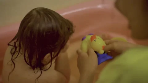 Children play in the bathroom, baby has diathesis Stock Footage 147173053