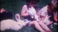 Children Play With Bunny Rabbits At Home 1950S Vintage Film Home Movie Stock Footage