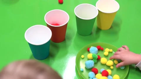 Children play with colors and learn to d... | Stock Video | Pond5