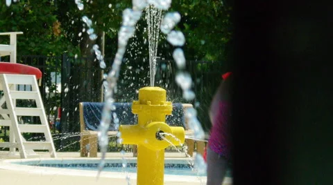 Children Play in Fire Hydrant Stock Footage 41429605