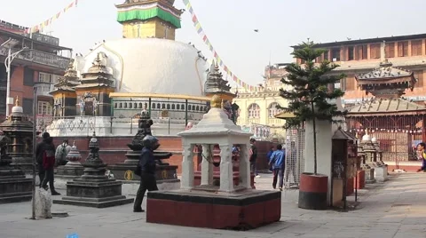 Children play football on the square near the stupa Stock Footage 59190175