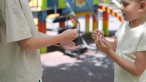 Children play a game of stone, ssissors. Stock Footage 302800428