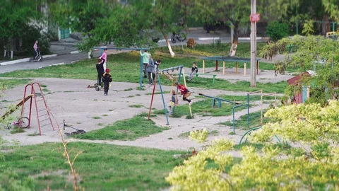 Children play in the large courtyard Stock Footage 107544254