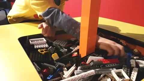 Children play with Lego Stock Footage 141507191