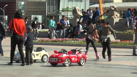 Children play in the main square of Ulaanbaatar. Mongolia. Stock Footage 302759193