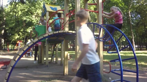 Children play on the playground Video stock 64808080